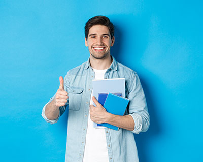 student with blue background